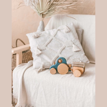 Traktorius su rąstais