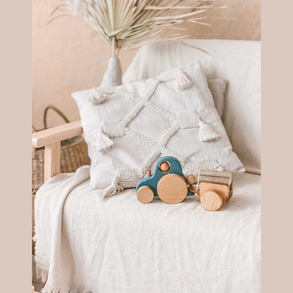 Traktorius su rąstais